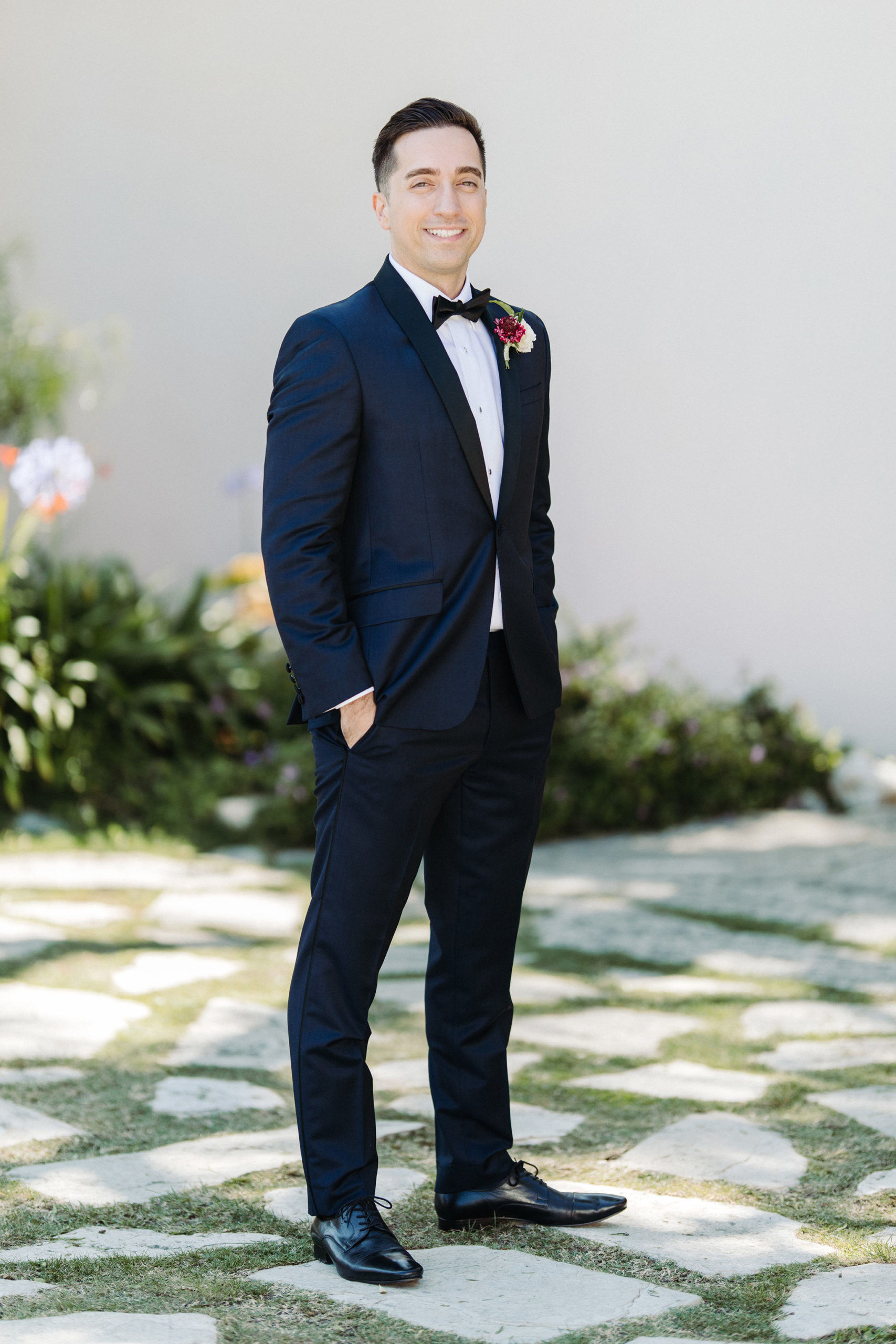 groom in the courtyard at Adamson House