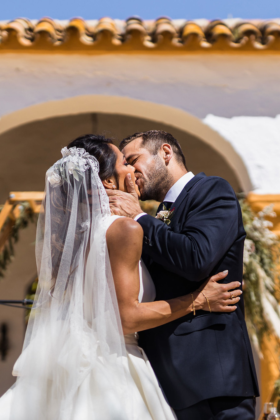 Spain destination wedding first kiss