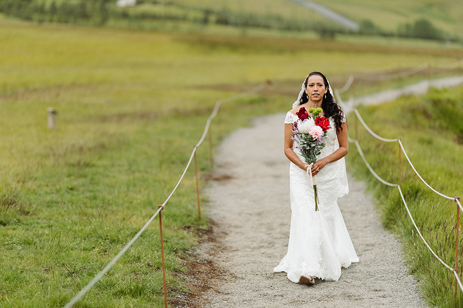 bride enters elopement ceremony in Iceland